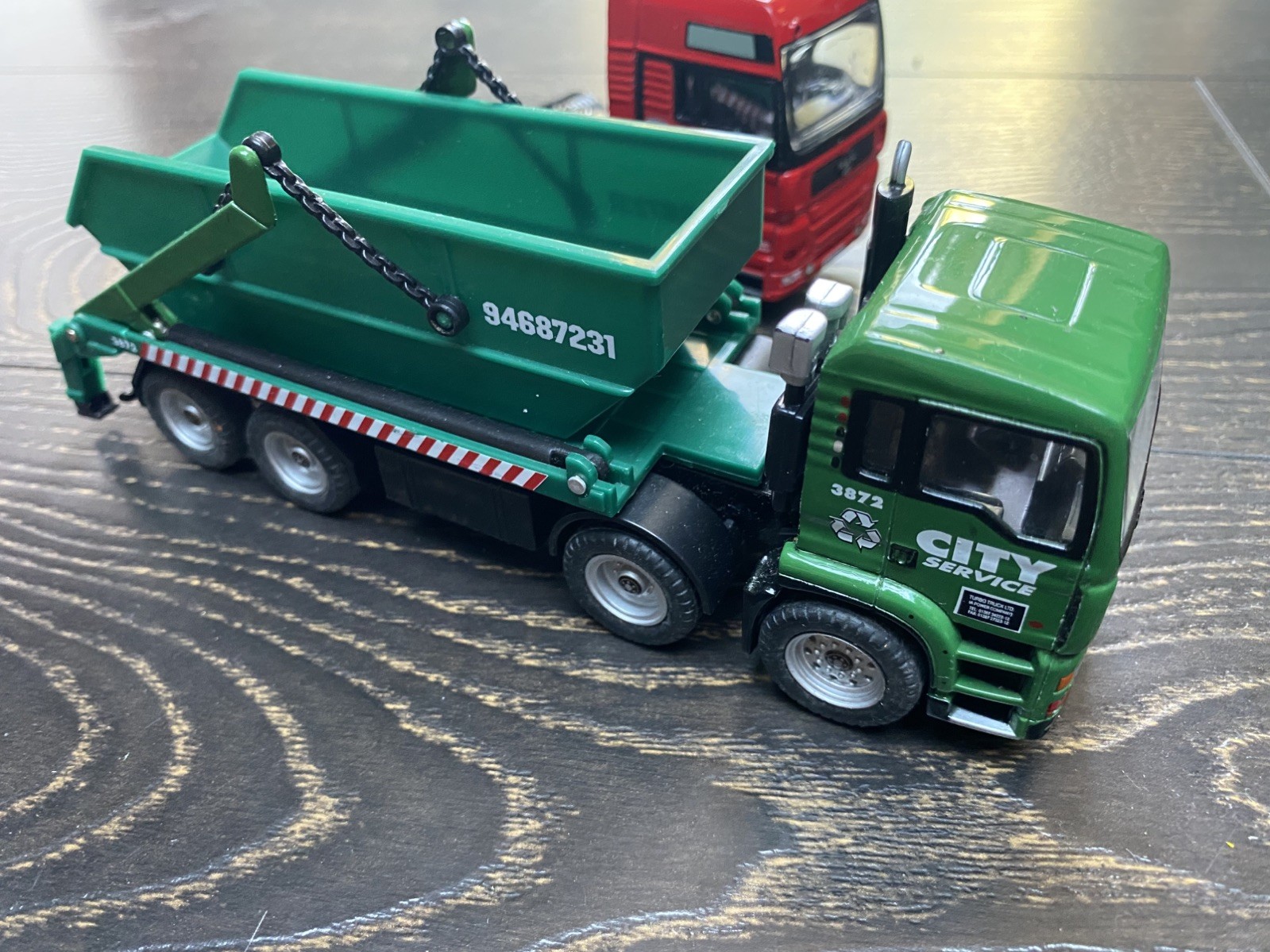 Action City REALTOY City MAN Skip Truck Dumpster & a MAN Racing Team Unit
