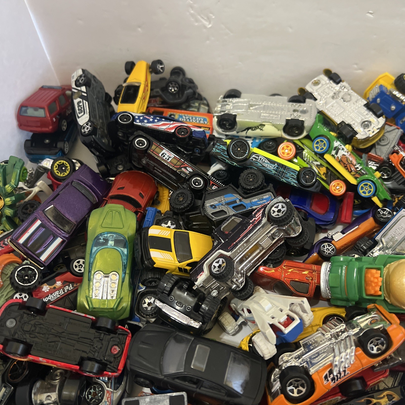 30 LBS Pounds of pure hotwheels. There are many different years and castings.