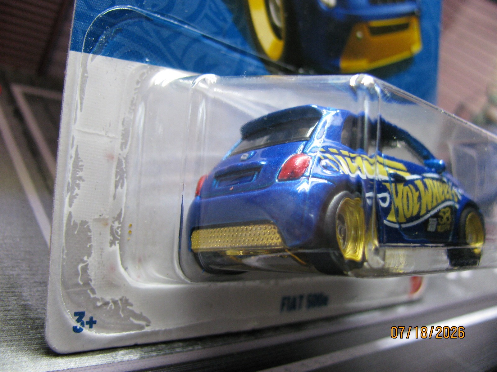 2026 Hot Wheels Fiat 500e 58th Anniversary Blue/Gold, w/Real Riders Wheel Swap