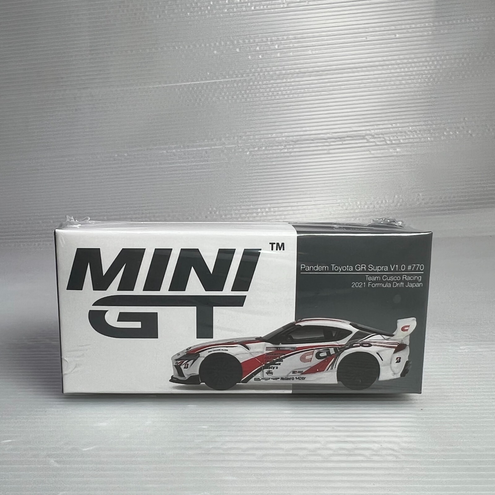 1/64 TSM Mini GT Toyota Supra Pandem GR V1.0 #770 Team Cusco 2021 MGT00364-R