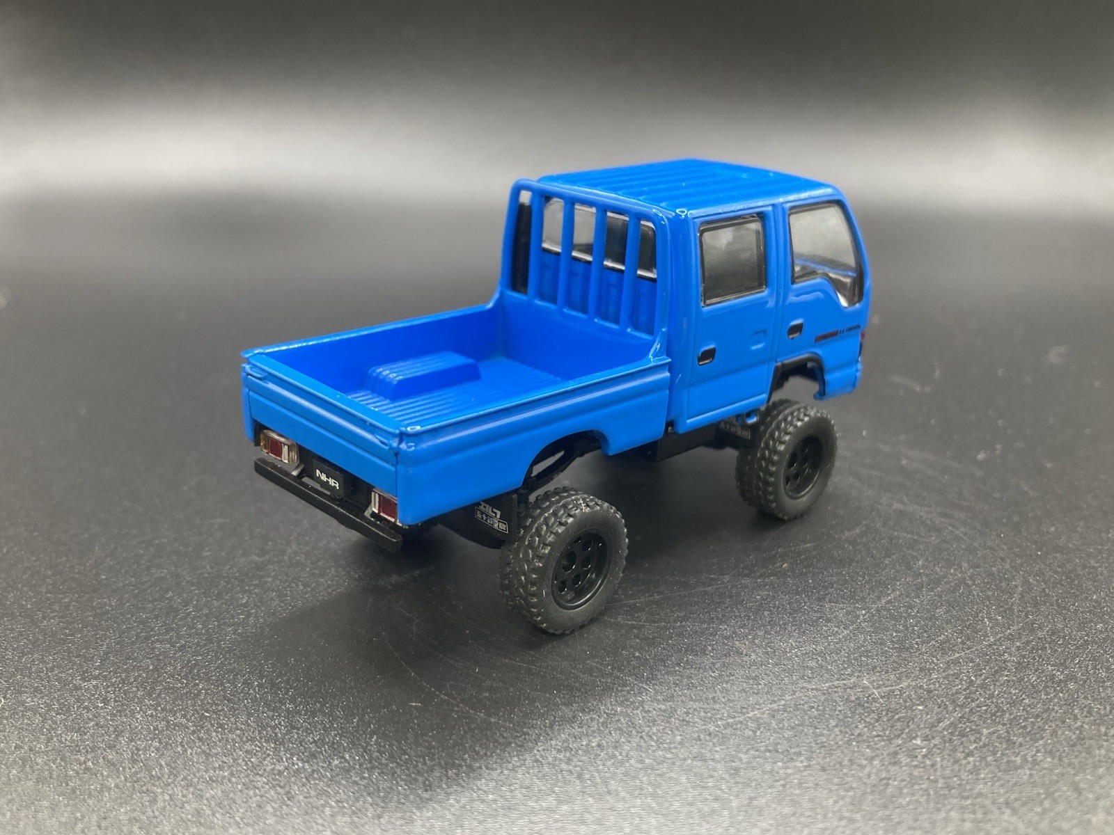Isuzu NHR Lifted 4×4 Pickup Truck 1/64 Scale Massdi Diecast Custom Model1